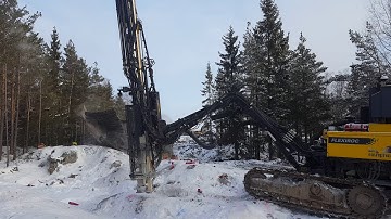 road foundation drilling with FlexiROC T30 and blasting