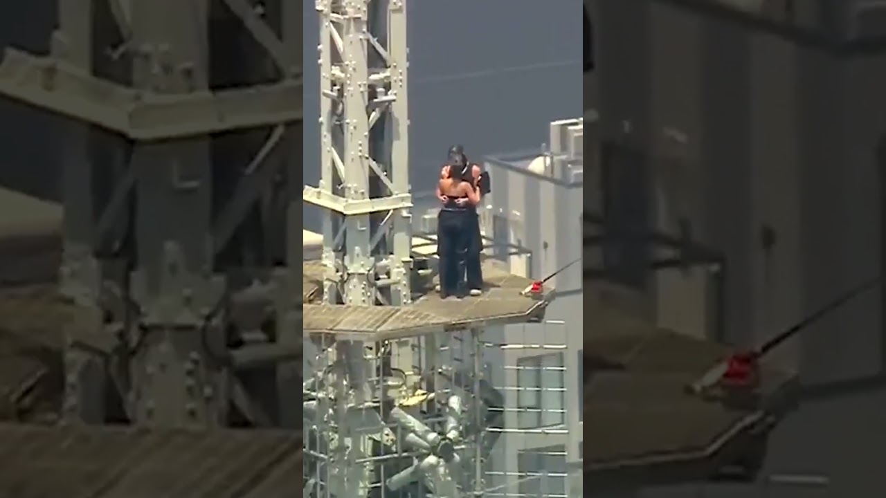 WATCH: 2 people climb to top of Empire State Building and appear to get engaged