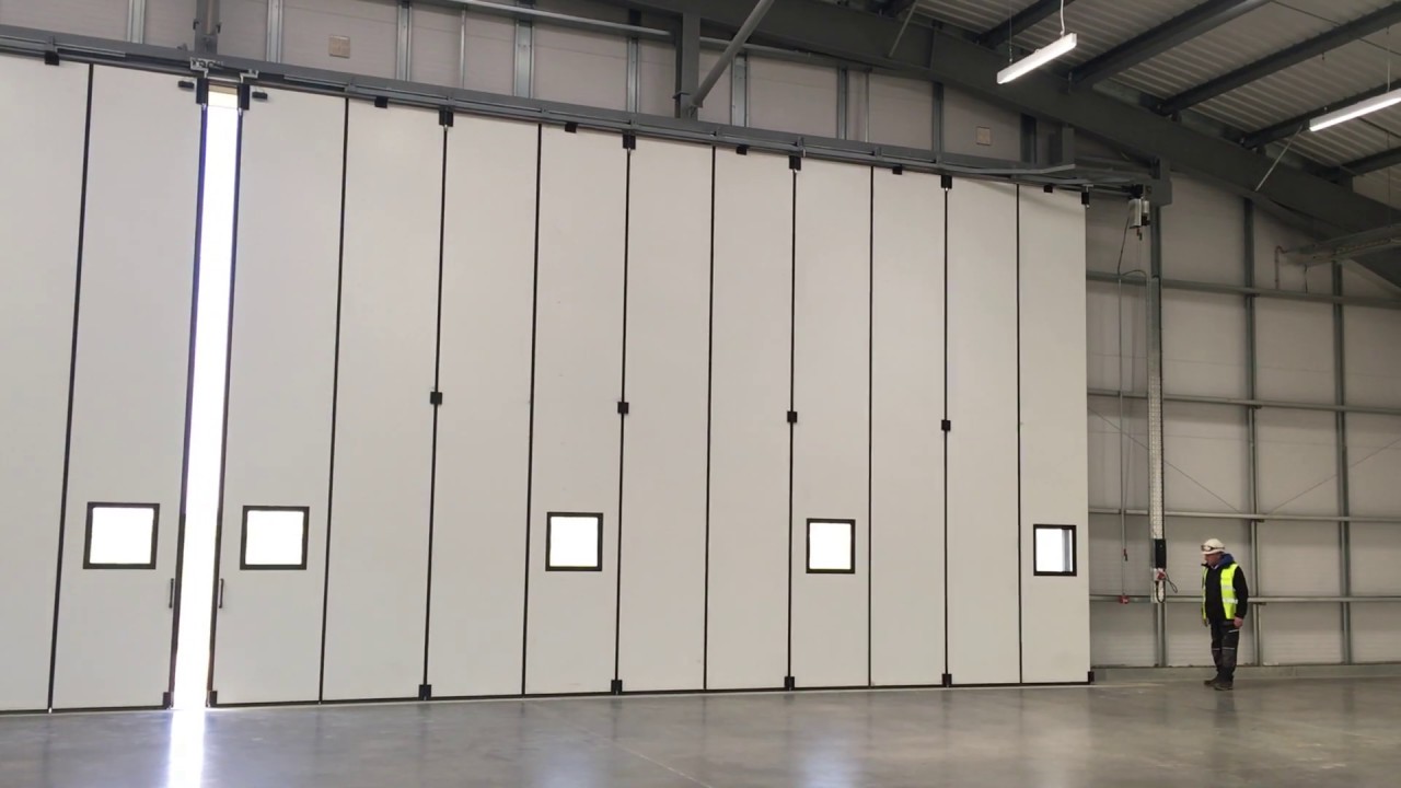 Jewers Osprey sliding folding hangar doors - YouTube