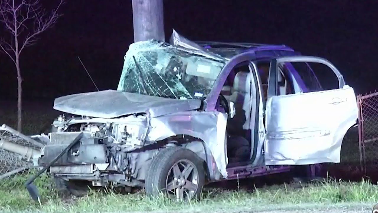 Driver extracted from vehicle, hospitalized after crashing into utility ...