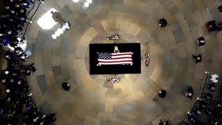 John McCain laid to rest after final journey