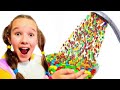 Emi and Niki Pretend Play a Magical Candy Shower | Hand shower m&m's