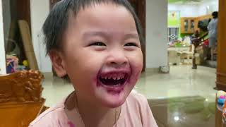 Baby eating thanh long