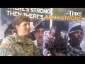 LTC Jennifer A. McAfee explains the US Army's tattoo policy at a recruiting center Wednesday. Some p