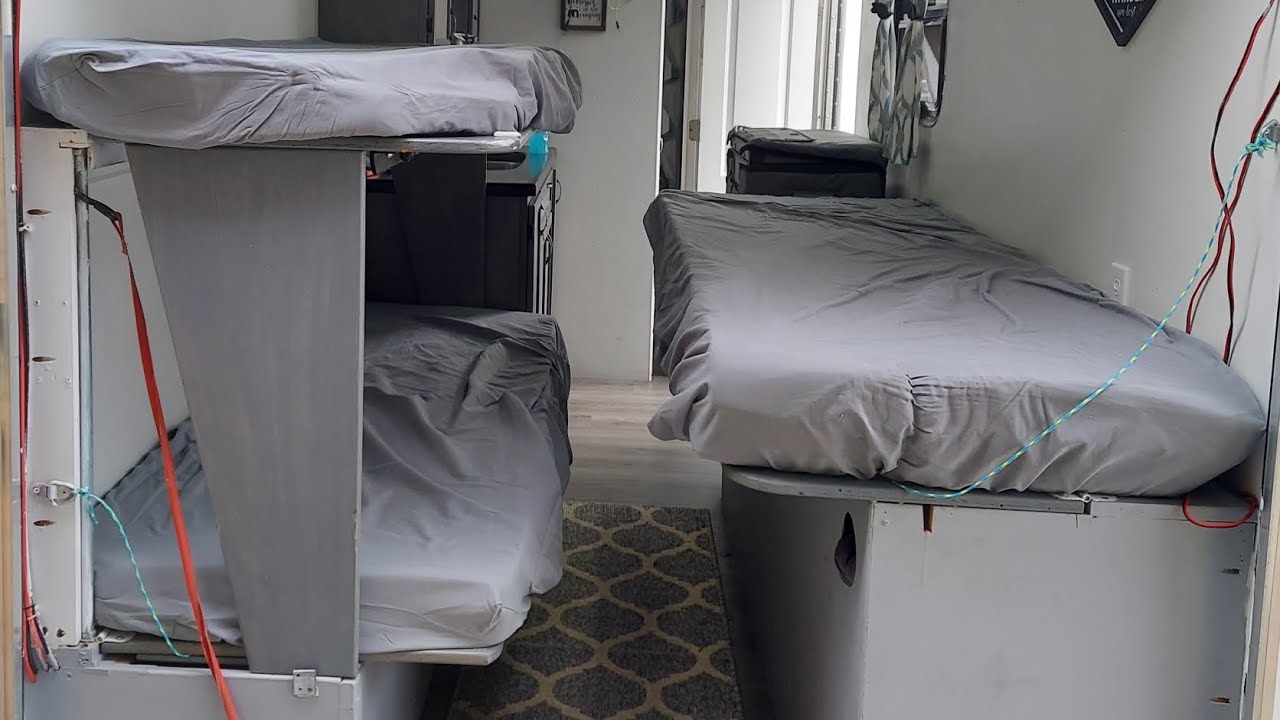 Folding Murphy Bunk Bed In 6x14 Cargo Trailer Conversion Cantilevered folding-murphy-bunk-bed-in-6x14-cargo-trailer-conversion-cantilevered