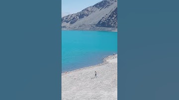 Bandir Blue Lake in the Pamir Plateau, originating from the melting water of snow-capped mountains