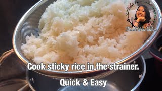 Cook sticky rice in the metal strainer.How to cook easy and quick sticky rice.Flower in the kitchen