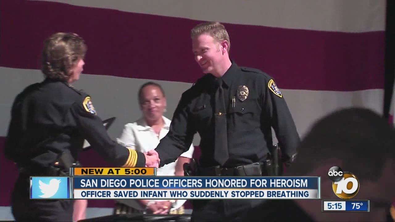 SDPD Officer Mark Herring honored for helping save woman's baby YouTube
