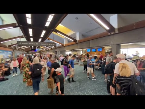 Residents, visitors flee from Maui as wildfires rage; Travel to the island discouraged