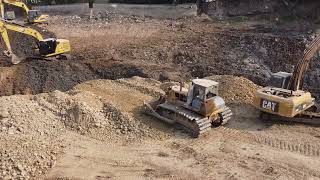 Rehabilitation of canals using many machinesSHANTUI SD16L Bulldozer Pushing Topsoil12