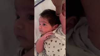 NEWBORN PULLING HER OWN HAIR AND DID NOT KNOW WHAT TO DO.