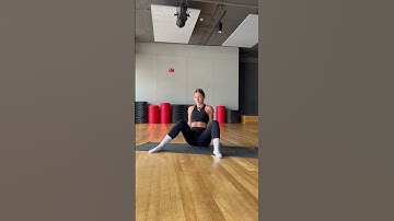Seated hip internal rotation knee drops