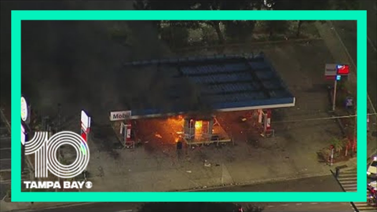 People set fire to Mobil gas station in Tampa YouTube
