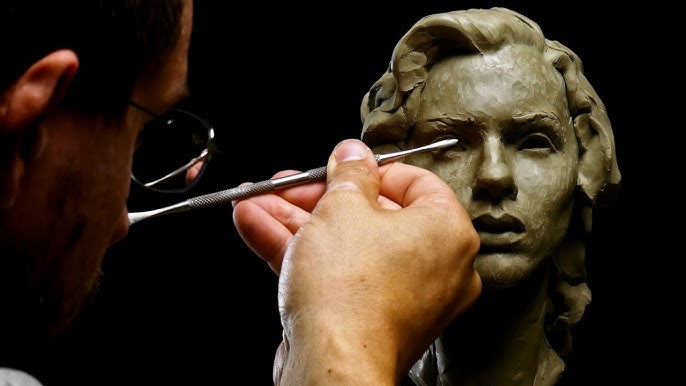 Sculpting a female head in clay. Sculpting tutorial and demo. 