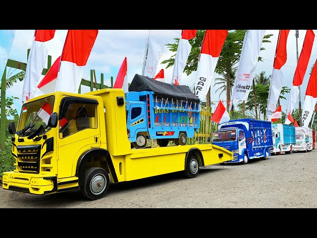 Shaky Truck Convoy Carrying Red and White Flags, Welcoming Indonesia's Independence Day class=