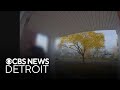 Michigan man charged with firing shots in neighbor's home