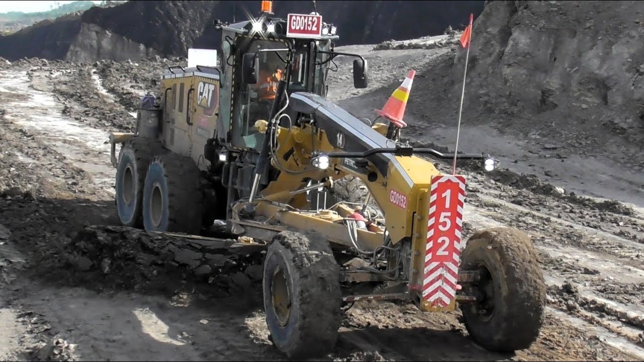 Caterpillar 14M3 Motor Grader Working On Wet Mine Roads! - Coal Mining Operations