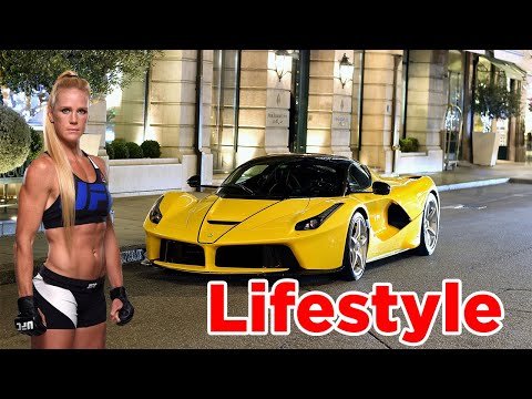 Video: Holly Holm Net Worth: Wiki, naimisissa, perhe, häät, palkka, sisarukset