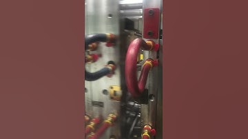 Injection molding robot picking and placing parts