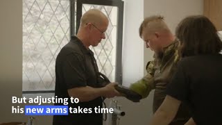 Decorated 'Hero of Ukraine' learns to live with bionic arms