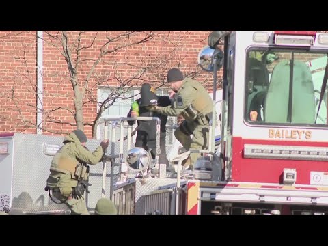 Armed man in custody after barricading on roof of Fairfax County ...