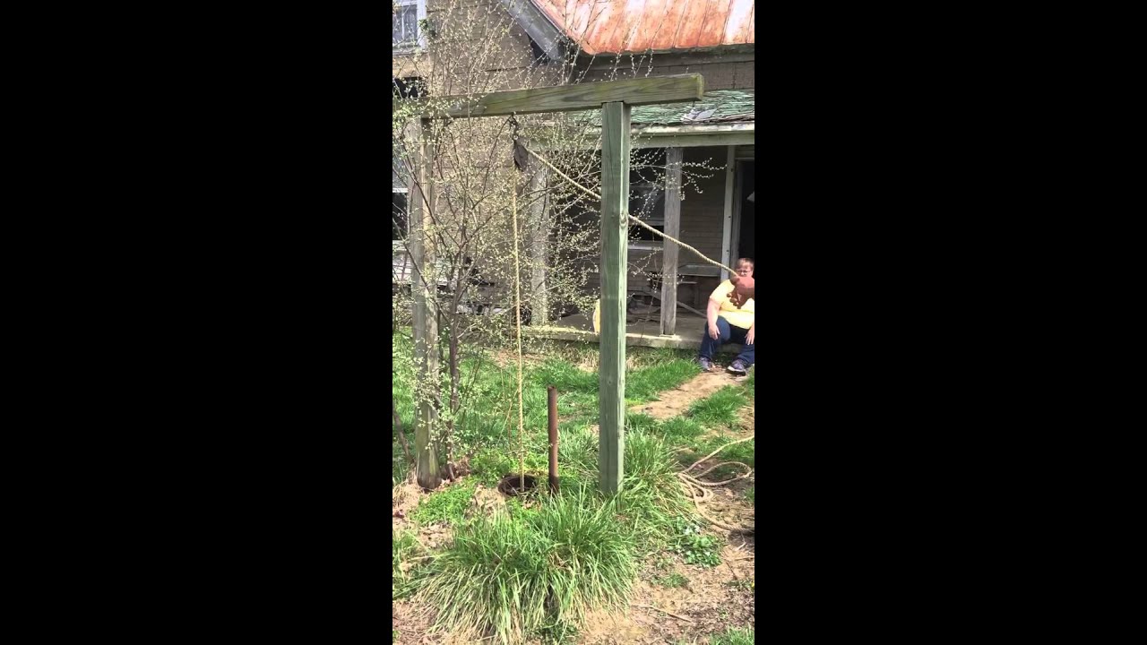 Drilled well water bucket at Noble White and Grace White farm in Jackson, Ohio