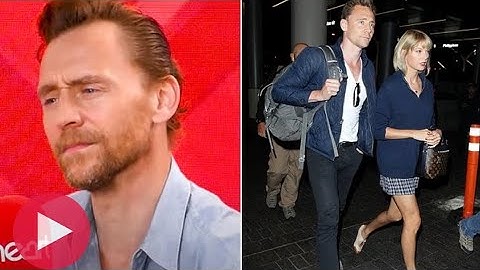 Tom Hiddleston cringes as he