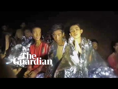 Boys trapped in Thailand comforted by rescuers