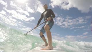 Sam and I sharing an knee height wave!