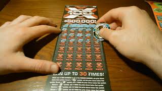 INSTANT WIN ON A $20 100 X MN LOTTERY SCRATCH OFF TICKET