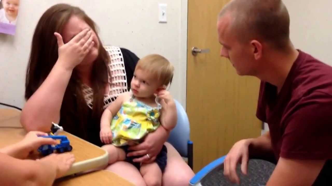 Cochlear implants- Genevieve hearing her parents for the first time 9-24-13