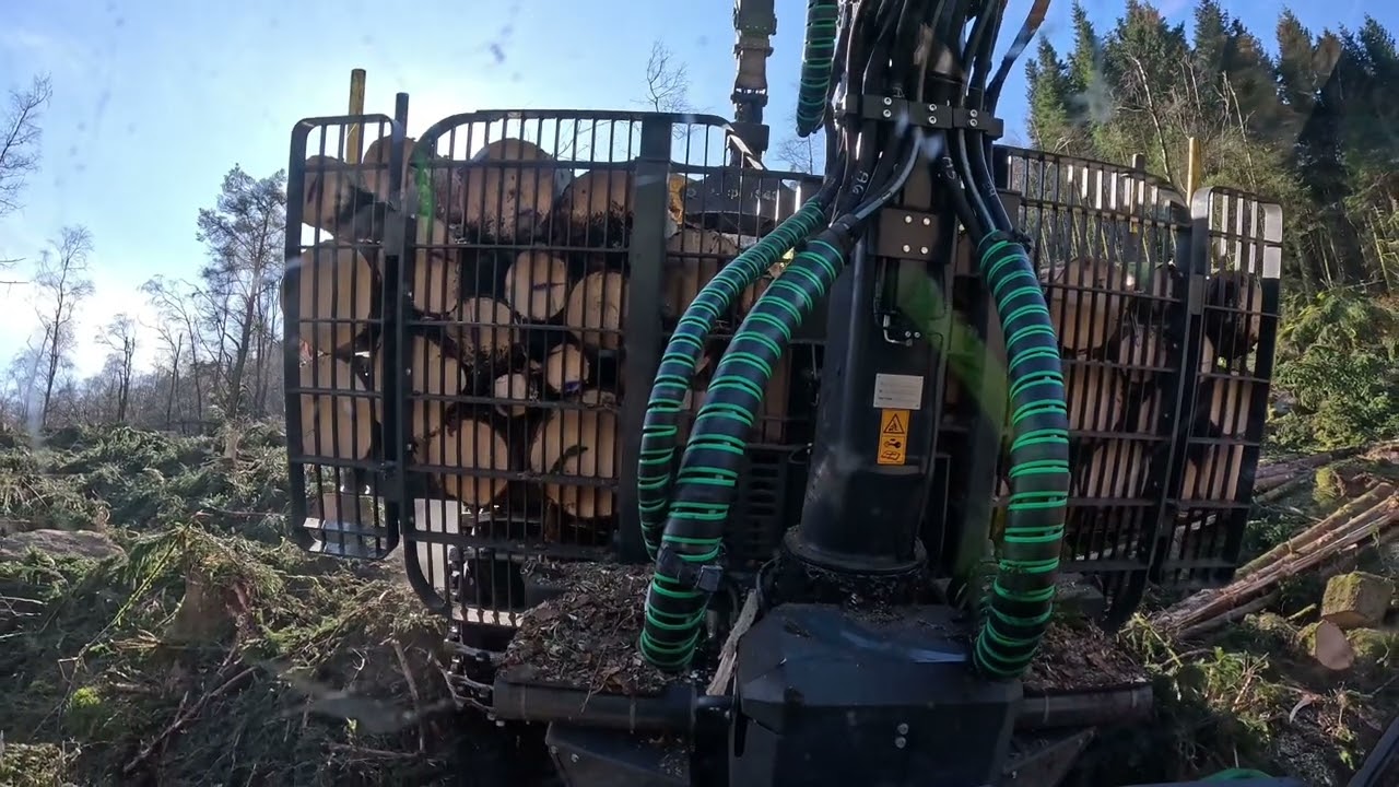 JohnDeere 1910g forwarder in Alpine Forest