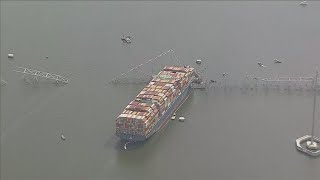 First responders begin clearing the remains of Key Bridge to continue the recovery mission