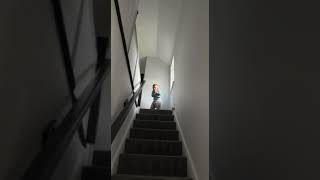 Guy and his son play catch then Dad throws ball to top of stairs and boy gets hit on his face
