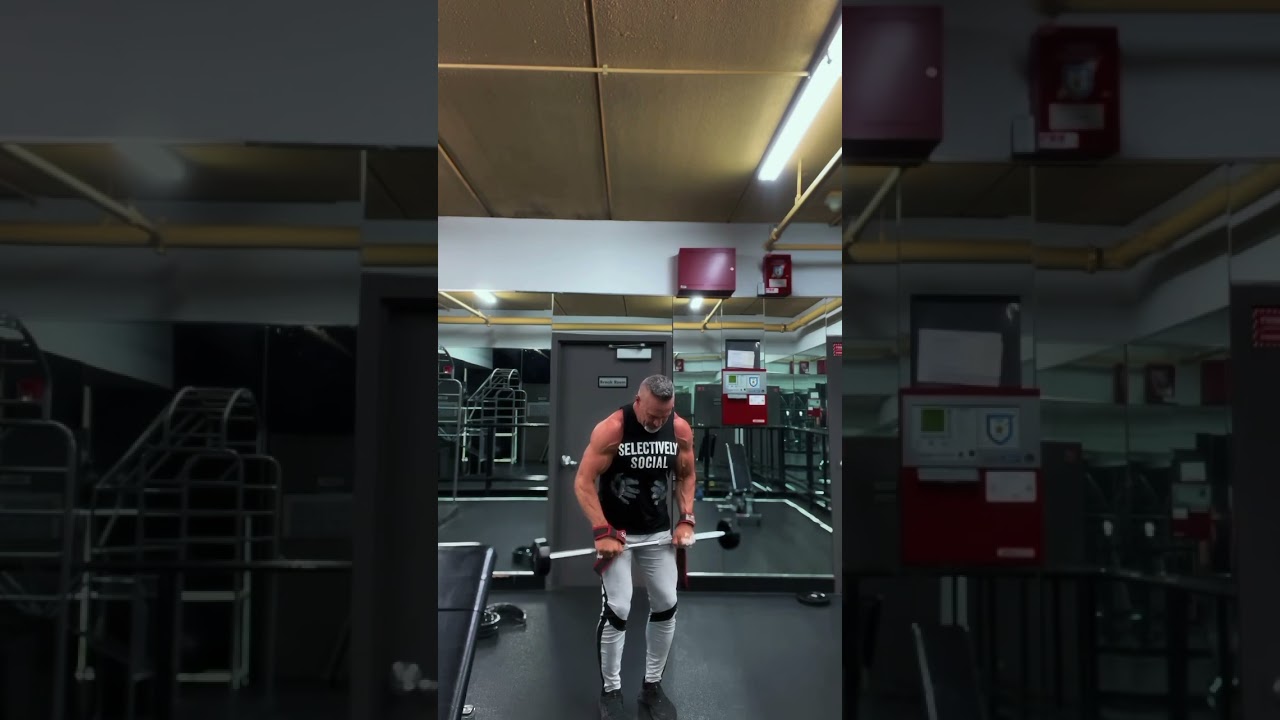 Standing barbell, front raises are a great way to isolate the front delts #shoulderworkout #shoulder