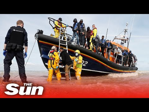 Children among rescued migrants escorted ashore in Kent after attempting to cross the Channel.