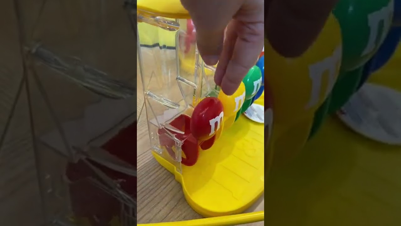 Dispensing mechanism for M&Ms. Simple but effective!
