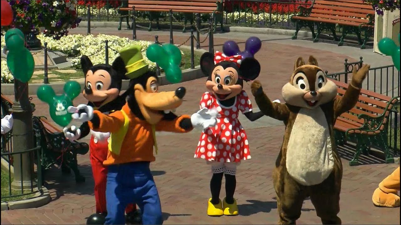 Disneyland 57th Birthday celebration with characters on Main Street USA