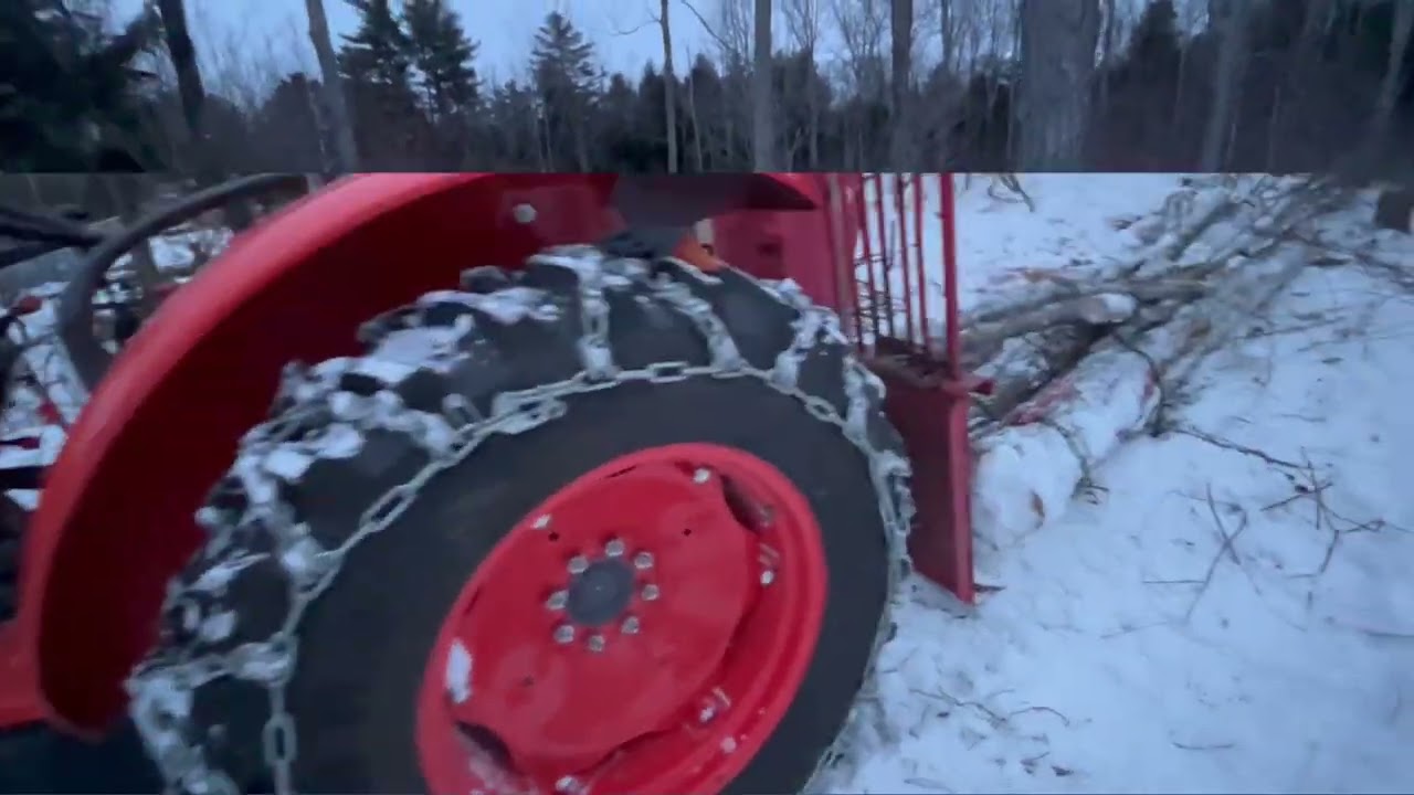 Logging with Kubota M5660 tractor and Norse 490 winch