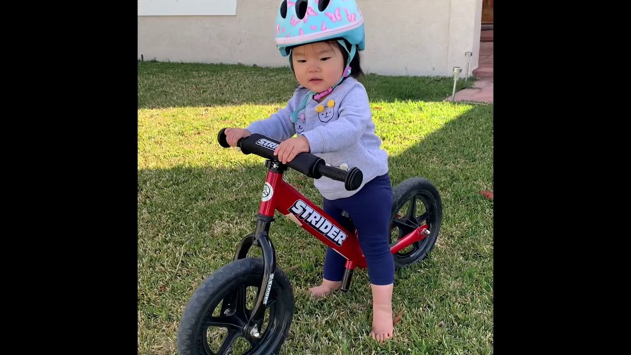 1 year old learning to ride a Strider Bike YouTube
