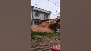 the process of unloading bricks from truck