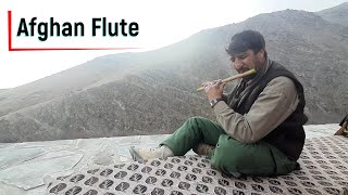 Afghan Flute Played by A Man In Mountains