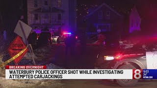 Waterbury police officer shot while investigating attempted carjackings