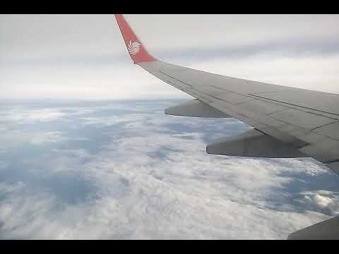 Suasana di atas awan ketika di dalam pesawat  YouTube