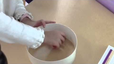 Marble rolling inside a circular tube with a gap