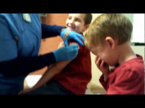 3 year old cries before his flu shot