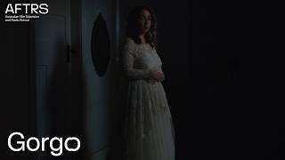 Scene: Gorgo | Directed by Veniamin Gialouris (Master of Arts Screen, 2021)
Gorgo tells the story of Medousa, an arranged Greek bride bound for Australia, who discovers a monstrous secret that threatens to tear apart her best friend’s promise of sisterhood. The Master of Arts Screen production has received critical acclaim, including Australian Directors Guild’s Best Direction of a Student Film awarded to Veniamin Gialouris and Flickerfest’s Avid Award for Best Original Music in an Australian Short Film awarded to Sam Weiss.
CREW
Writer - Danielle Stamoulos
Director - Veniamin Gialouris
Producer - Katie Amos
Cinematographer - Petra Leslie
Production Design - Emily Jansz
Costume Design - Merette Boutros
Editor - Sam Grammer
Sound Supervision - Andrew Thomas Dean
Original Music - Samuel Weiss
CAST
Danielle Stamoulos
Ariadne Sgouros
Damien Strouthos
Jeremy Raftos
Chris Stamoulos
Maria Panagis
Alex Pantazes
John Daviskas
Zois Patelis
Subscribe for more from AFTRS:
↳ AFTRS: http://hyperurl.co/AFTRS_Subscribe
Find out more about AFTRS and follow us on socials:
↳ Facebook: https://www.facebook.com/aftrs
↳ Instagram: https://instagram.com/aftrs
↳ TikTok: https://www.tiktok.com/@aftrsgoodcontent
↳ LinkedIn: https://www.linkedin.com/school/australian-film-television-and-radio-school/
Find out more about the Australian Film Television and Radio School (AFTRS):
↳ https://www.aftrs.edu.au Scene: Gorgo | Directed by Veniamin Gialouris (Master of Arts Screen, 2021)