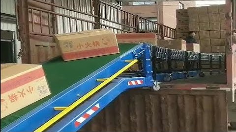 Automatic truck loading conveyor