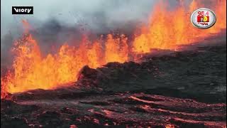Residents and tourists forced to flee after lava breaches barriers in Iceland