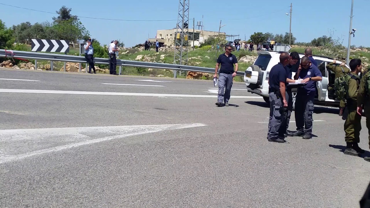Israeli killed as Palestinian rams car into West Bank bus stop - YouTube